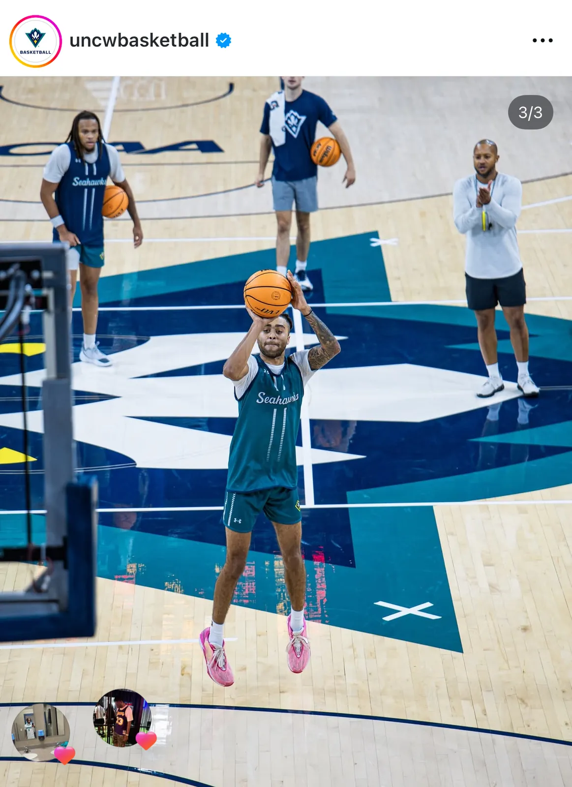 CJ Luster II handling the basketball at UNCW