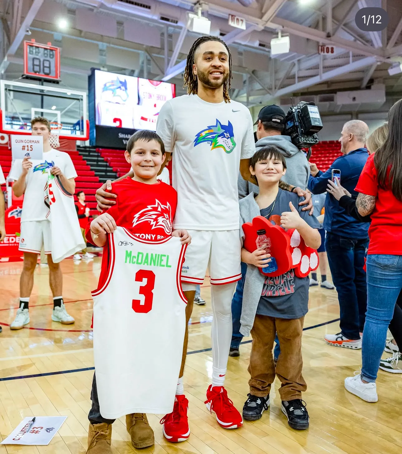 CJ Luster II with young fans