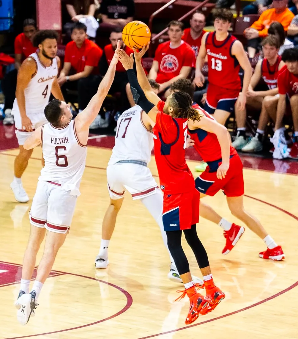 CJ Luster II shooting over a defender