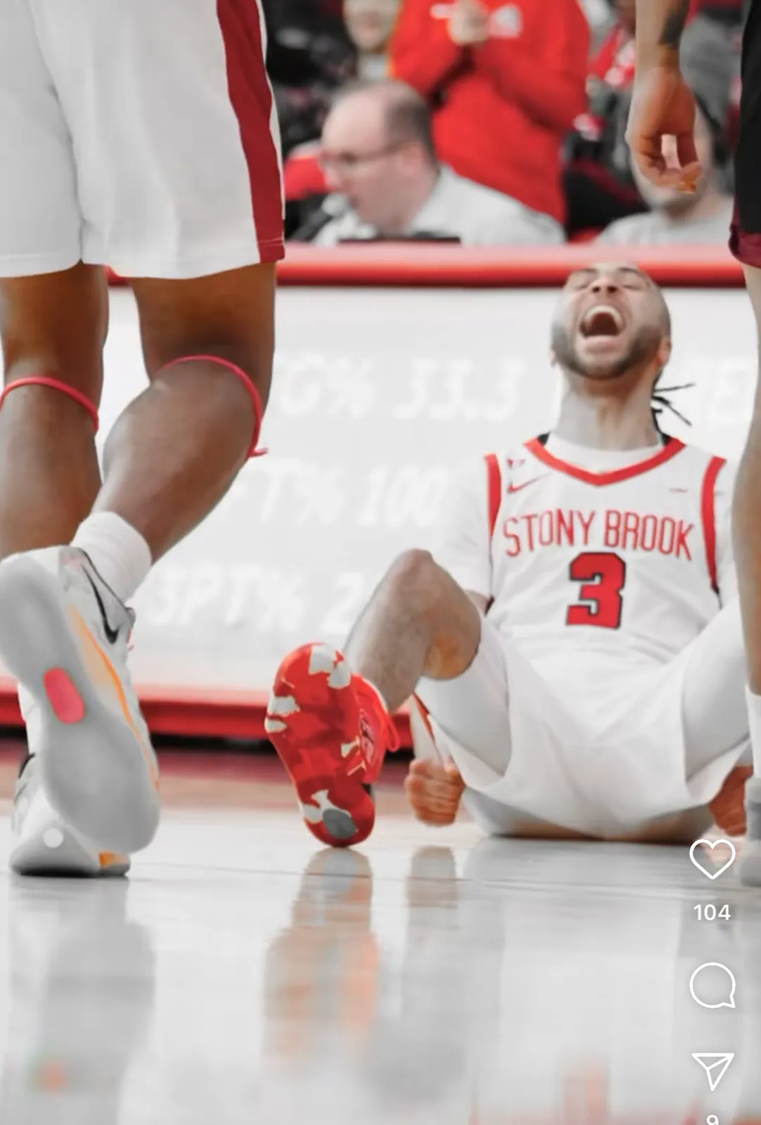 CJ Luster II on the floor after an and-one play